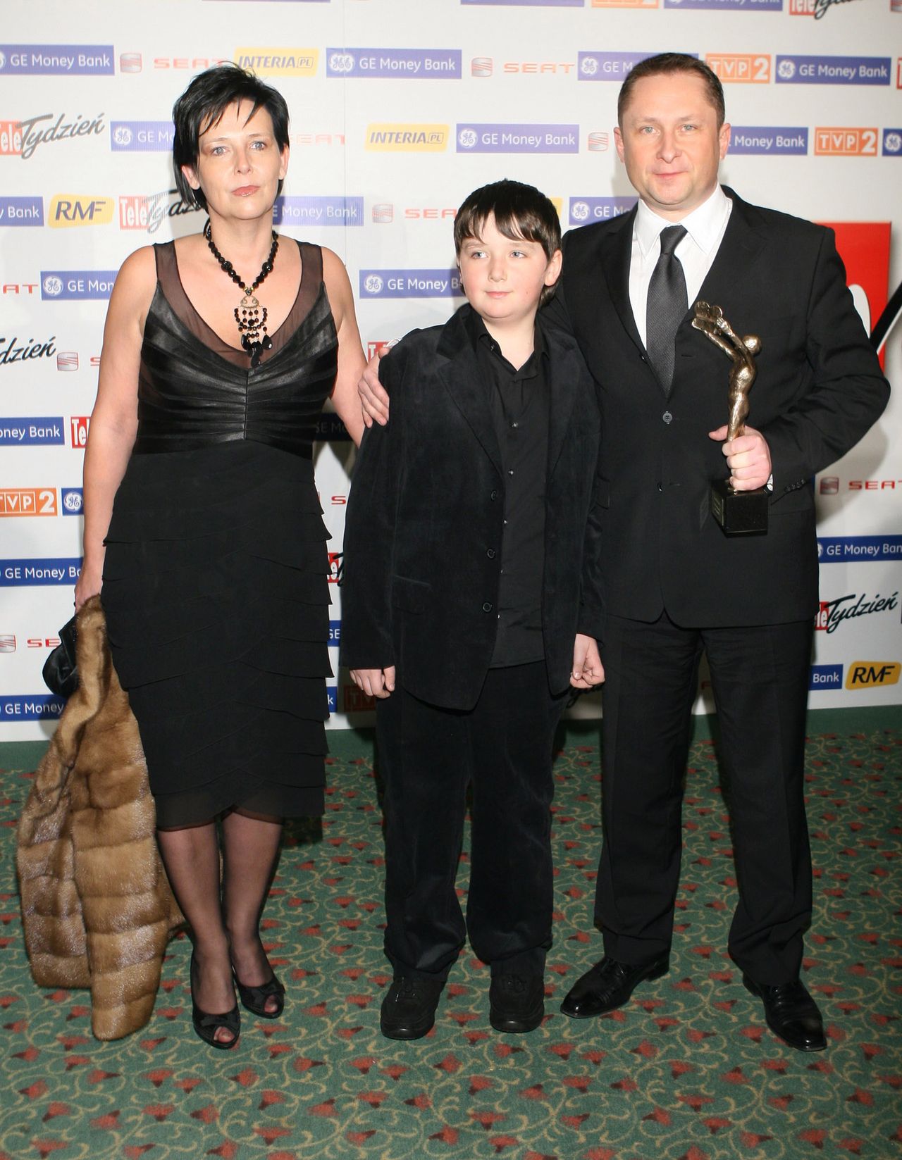 Kamil Durczok, jego syn Kamil i żona Marianna
