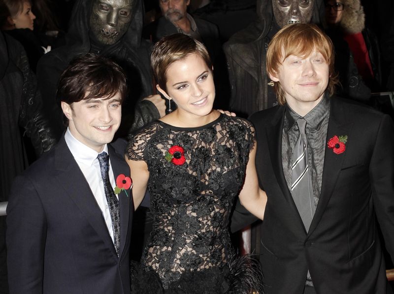 Actors Daniel Radcliffe (left), Emma Watson and Rupert Grint on the red carpet for the world premiere of the latest Harry Potter movie, "Harry Potter and the Deathly Hallows Part 1", in London, Britain, 11 November 2010.