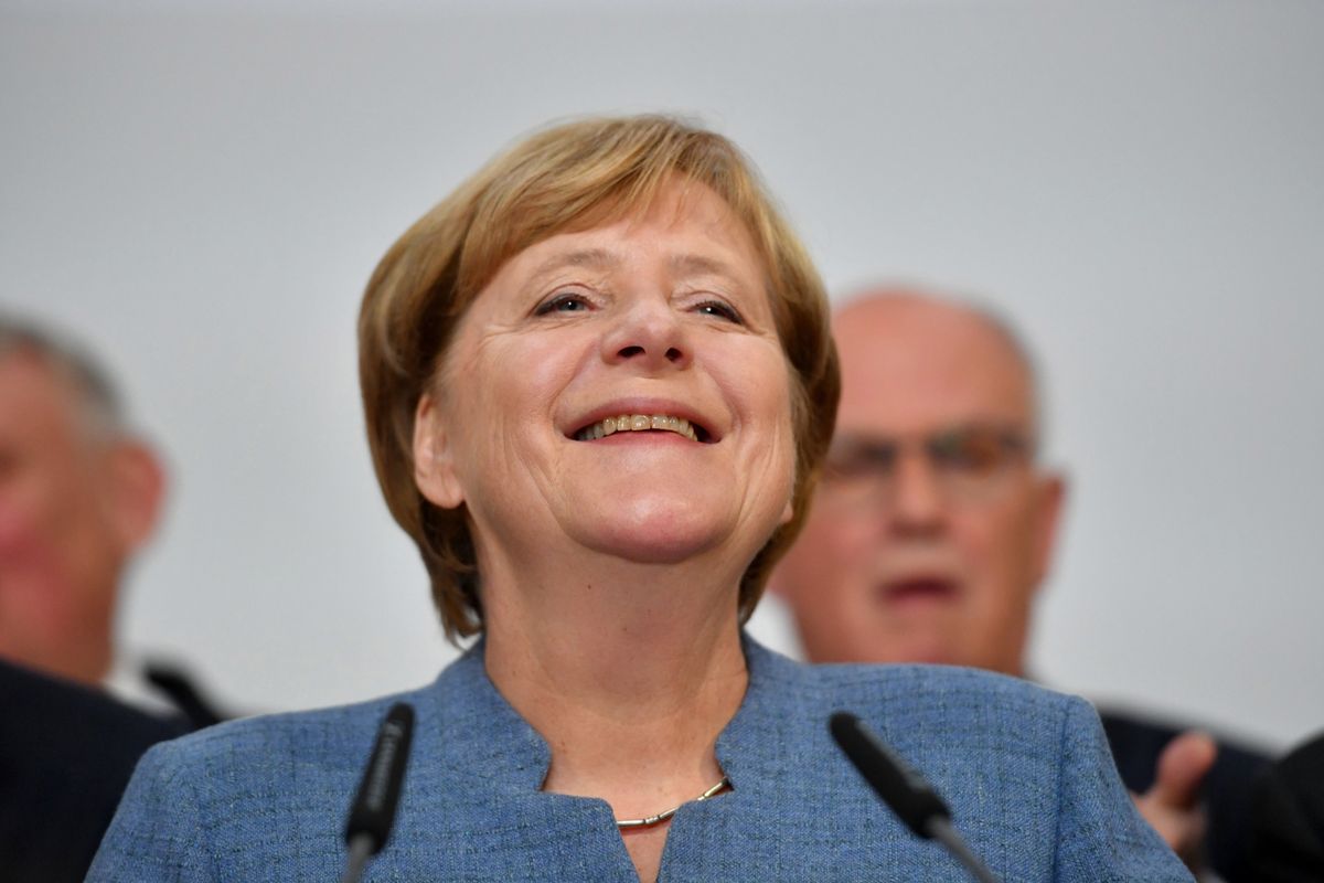 Angela Merkel odbiera gratulacje. Według sondaży jej partia wygrała wybory