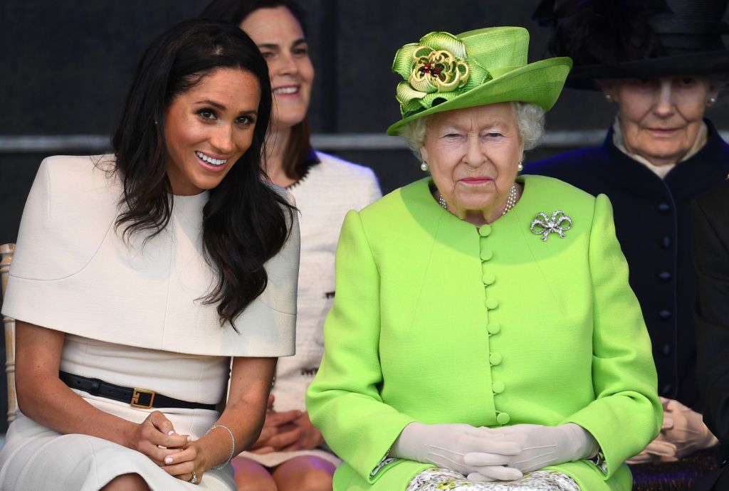 WIDNES, CHESHIRE, ENGLAND - JUNE 14:  Queen Elizabeth II and Meghan, Duchess of Sussex arrive to open the new Mersey Gateway Bridge on June 14, 2018 in the town of Widnes in Halton, Cheshire, England. Meghan Markle married Prince Harry last month to become The Duchess of Sussex and this is her first engagement with the Queen. During the visit the pair will open a road bridge in Widnes and visit The Storyhouse and Town Hall in Chester.  (Photo by Jeff J Mitchell/Getty Images) 