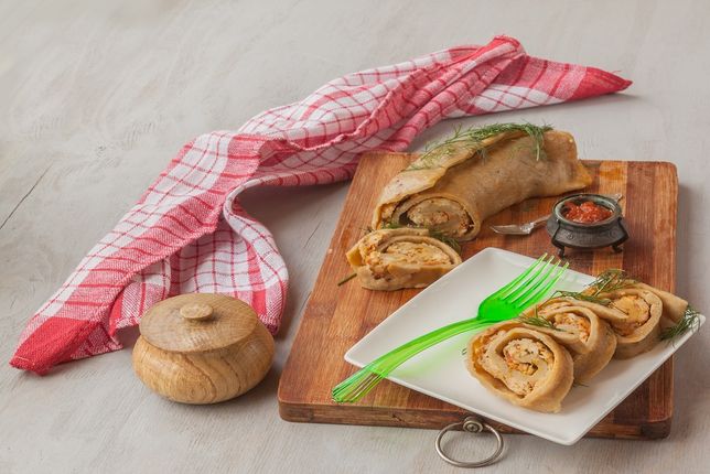 Hanuma or hanym - roll dough and meat stuffing, traditional Asian dishes, steamed.  