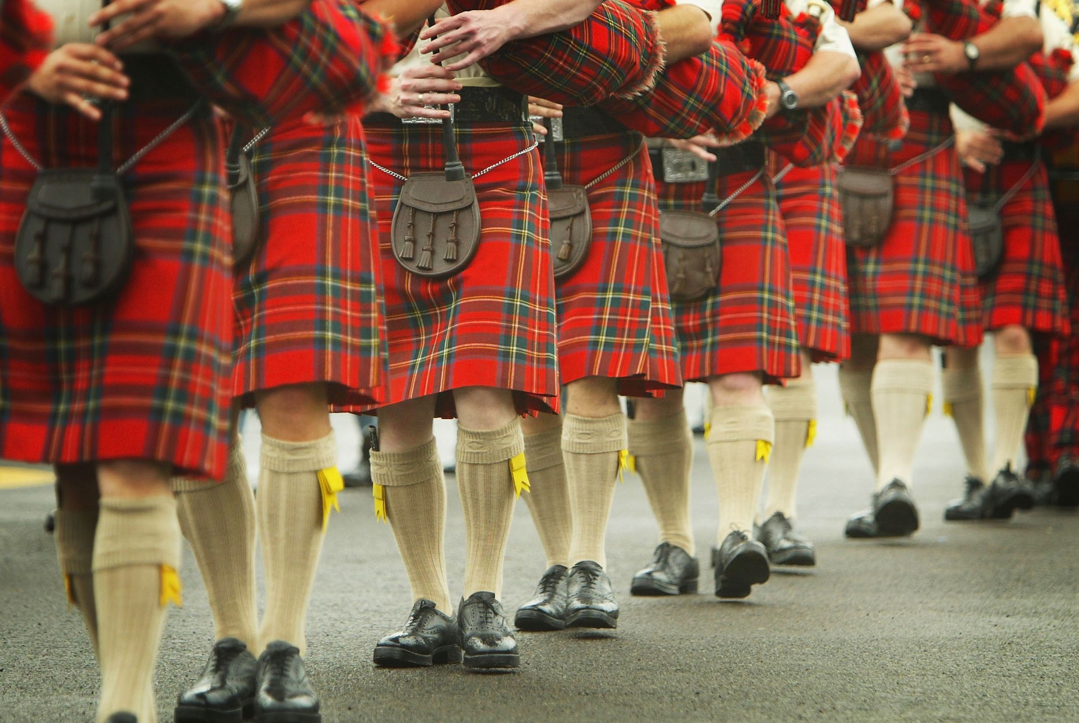 EDINBURGH, SCOTLAND - AUGUST 4: Scottish pipers take to the parde ground at Redford Barracks on August 4th, 2004 in Edinburgh, Scotland.Military Bands and performers from throughout the world braved the Scottish rain and gathered for a final rehearsal of forthcoming  55th Edinburgh Military Tattoo . (Photo by Chris Furlong/Getty Images) 