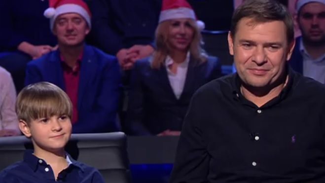 Mateusz Winek i Tomasz Karolak na planie "Milionerów"