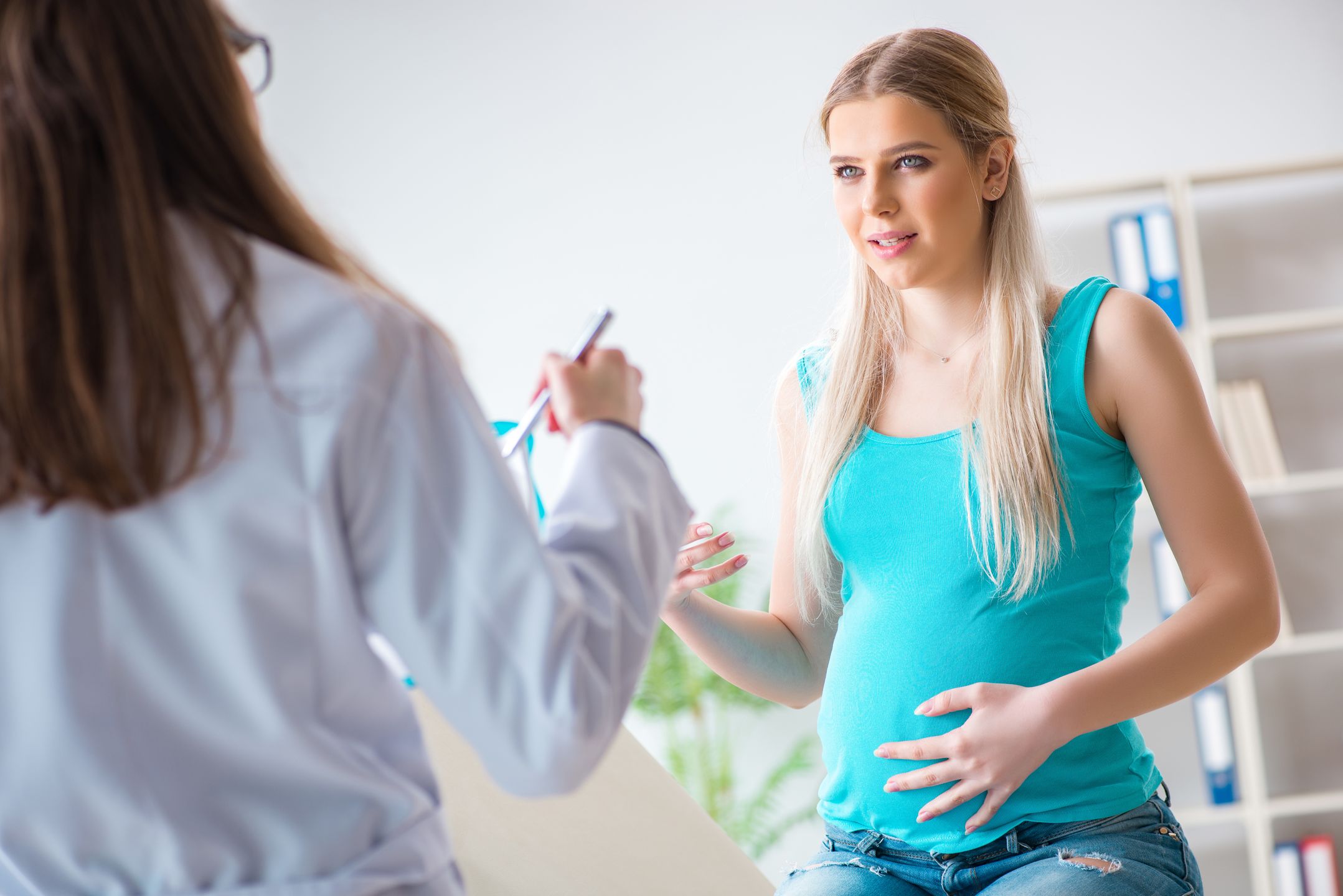 Pregnant woman at regular pregnancy check-up 
