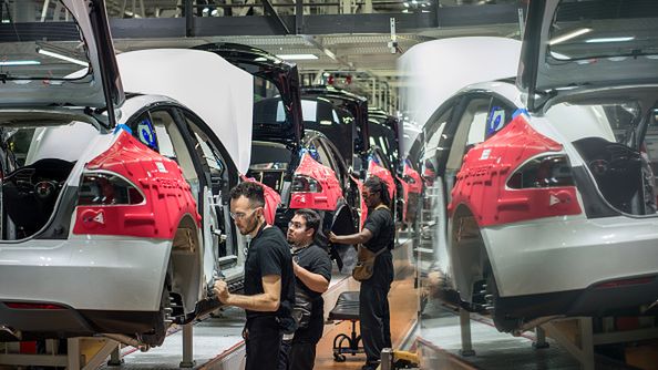 FEBRUARY 4, 2015 FREMONT, CA Workers assemble cars on the line at Tesla's factory in Fremont. David Butow (Photo by David Butow/Corbis via Getty Images)