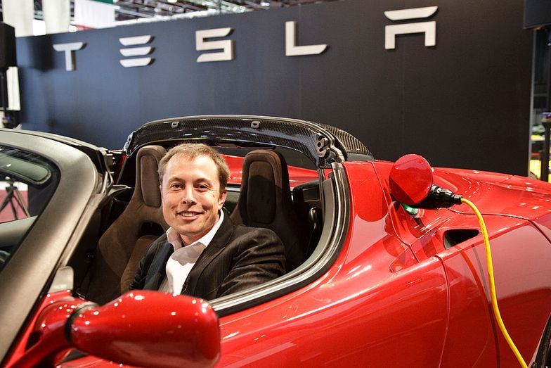 Elon Musk , Chairman of the board of directors and CEO of Tesla Motors (former President  and founder of Paypal) at a Tesla Motors press conference at the 2009 North American Auto Show.  Tesla makes the Tesla Roadster which is an all-electric sports car