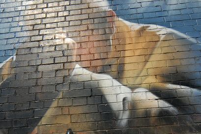 Papieskie graffiti na murze krakowskiego ASP