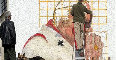 Studenci malują graffiti Ojca Świętego