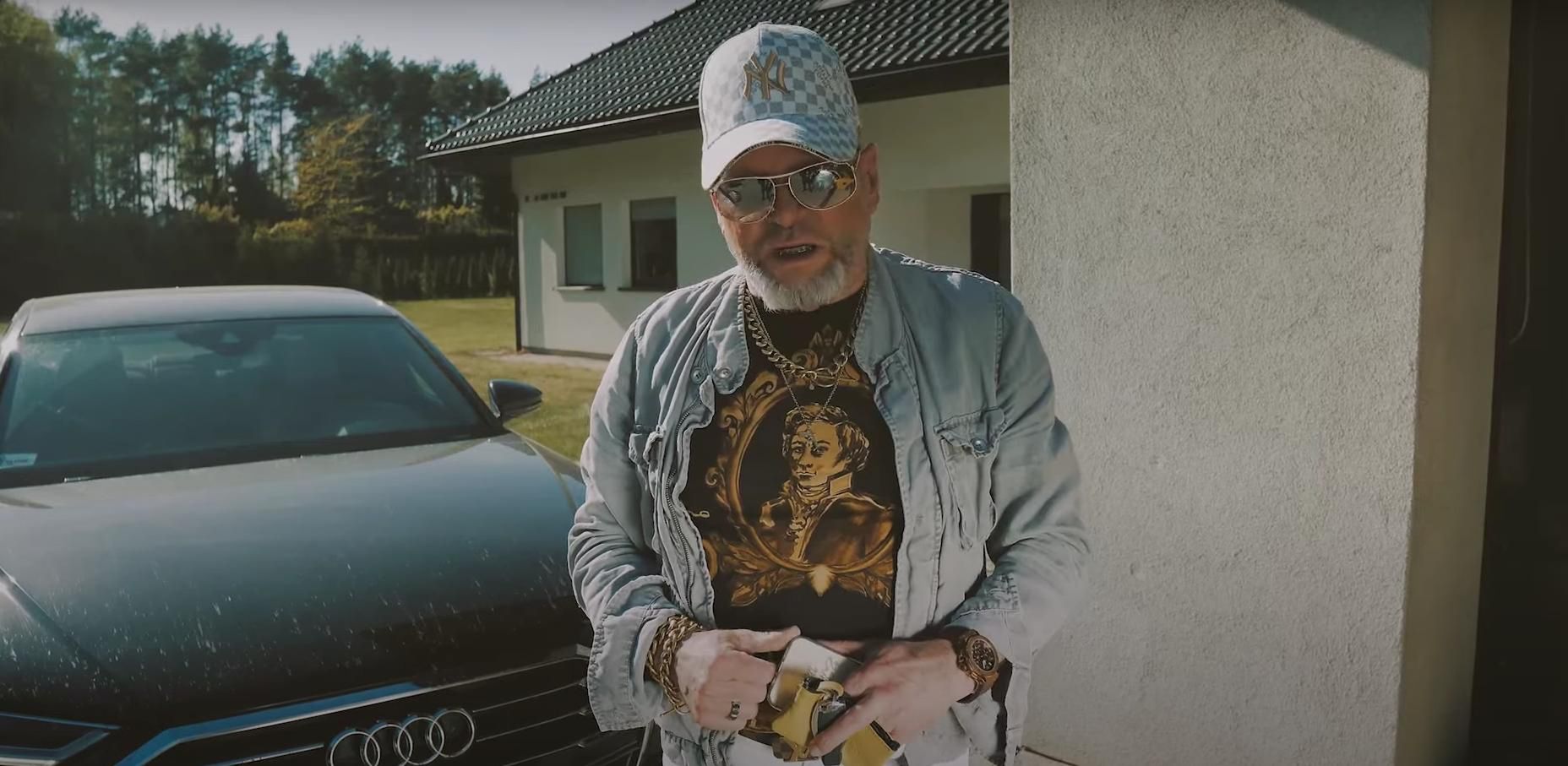 Krzysztof Rutkowski i jego flotylla aut ( Audi A8)