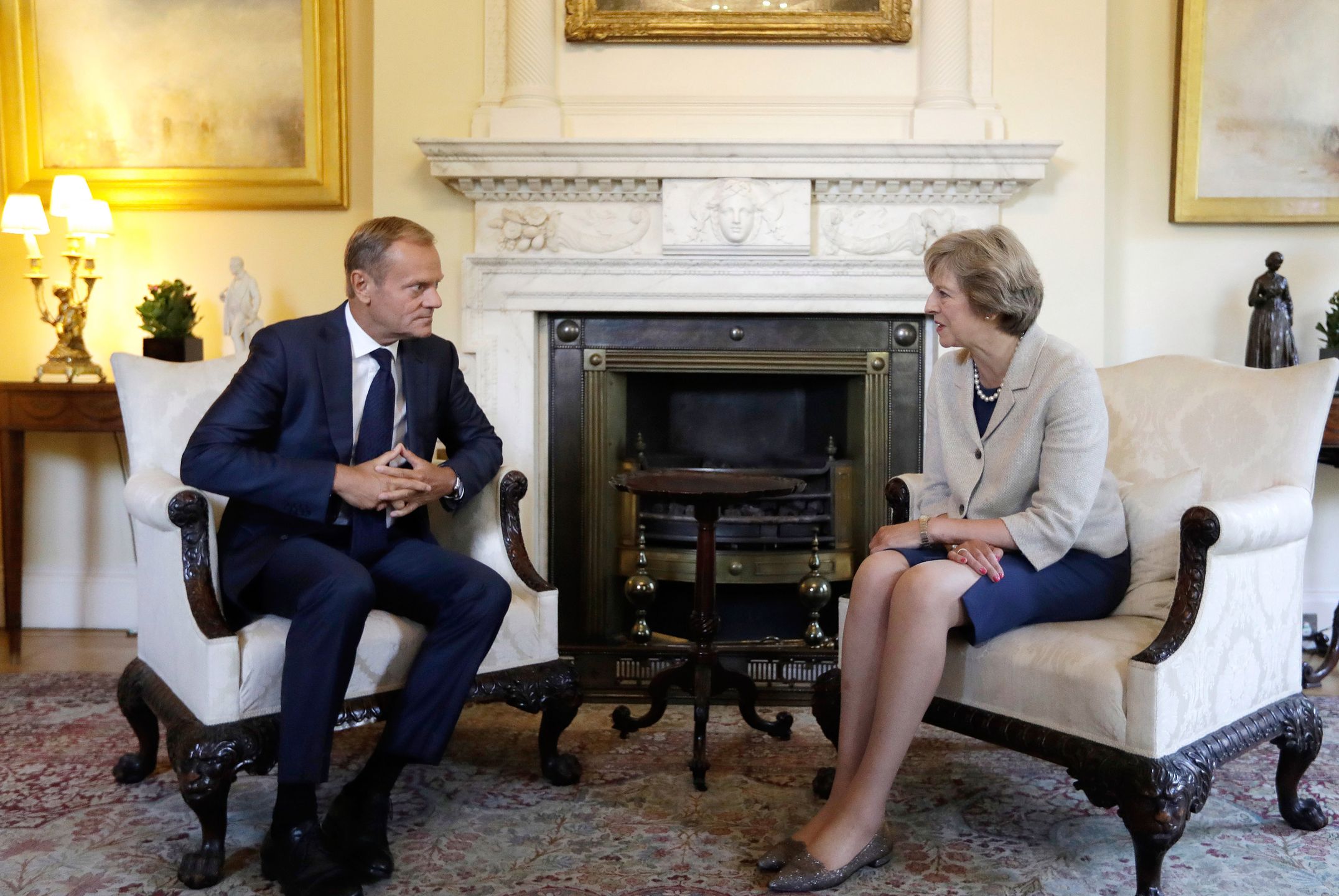 Britain's Prime Minister Theresa May, right, talks with President of the European Council Donald Tusk at 10 Downing Street in London, Thursday, Sept. 8, 2016. They met for a bilateral meeting to discuss Brexit, amid increasing pressure over a lack of detail in the Government's stated strategy. (AP Photo/Kirsty Wigglesworth, Pool)