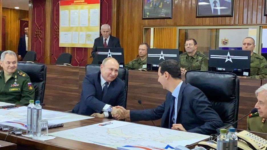 Prezydent Rosji Władimir Putin (L) oraz prezydent Syrii Baszar al-Asad (P)