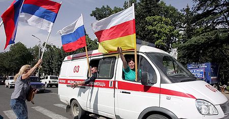 Radość, flagi, karabiny