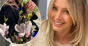 Majówka 2023. Agnieszka Woźniak-Starak kusi w "DDTVN" jako pani wiosna, podczas gdy fan kręci aferę. W tle polska flaga