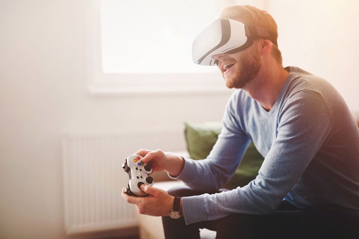 Handsome man enjoying games and  virtual reality 