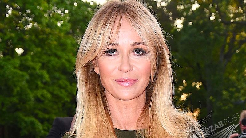 Joanna Przetakiewicz na pokazie Chanel w Paryżu w czerwonym kombinezonie