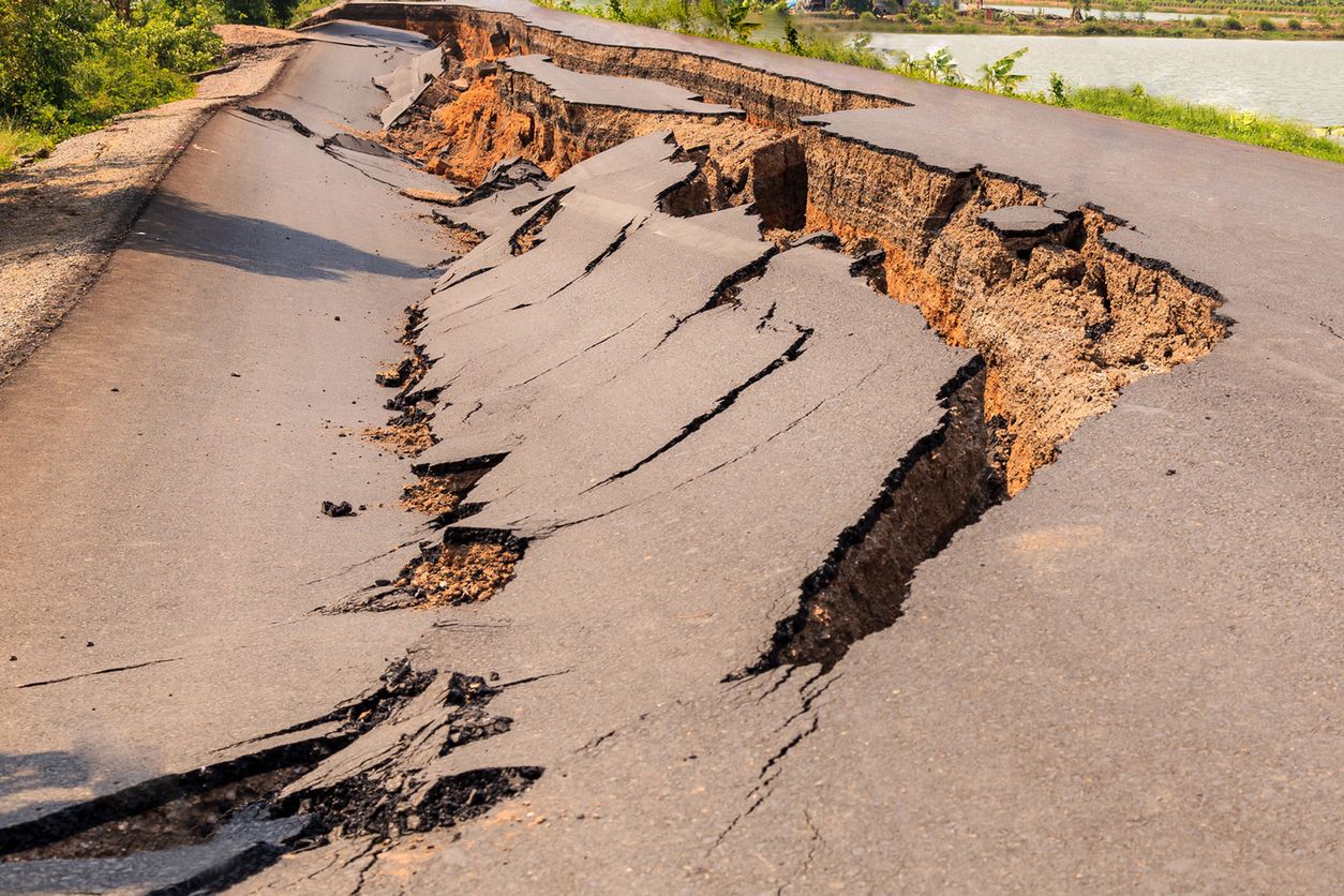 Cracked of asphalt road after the earthquake 