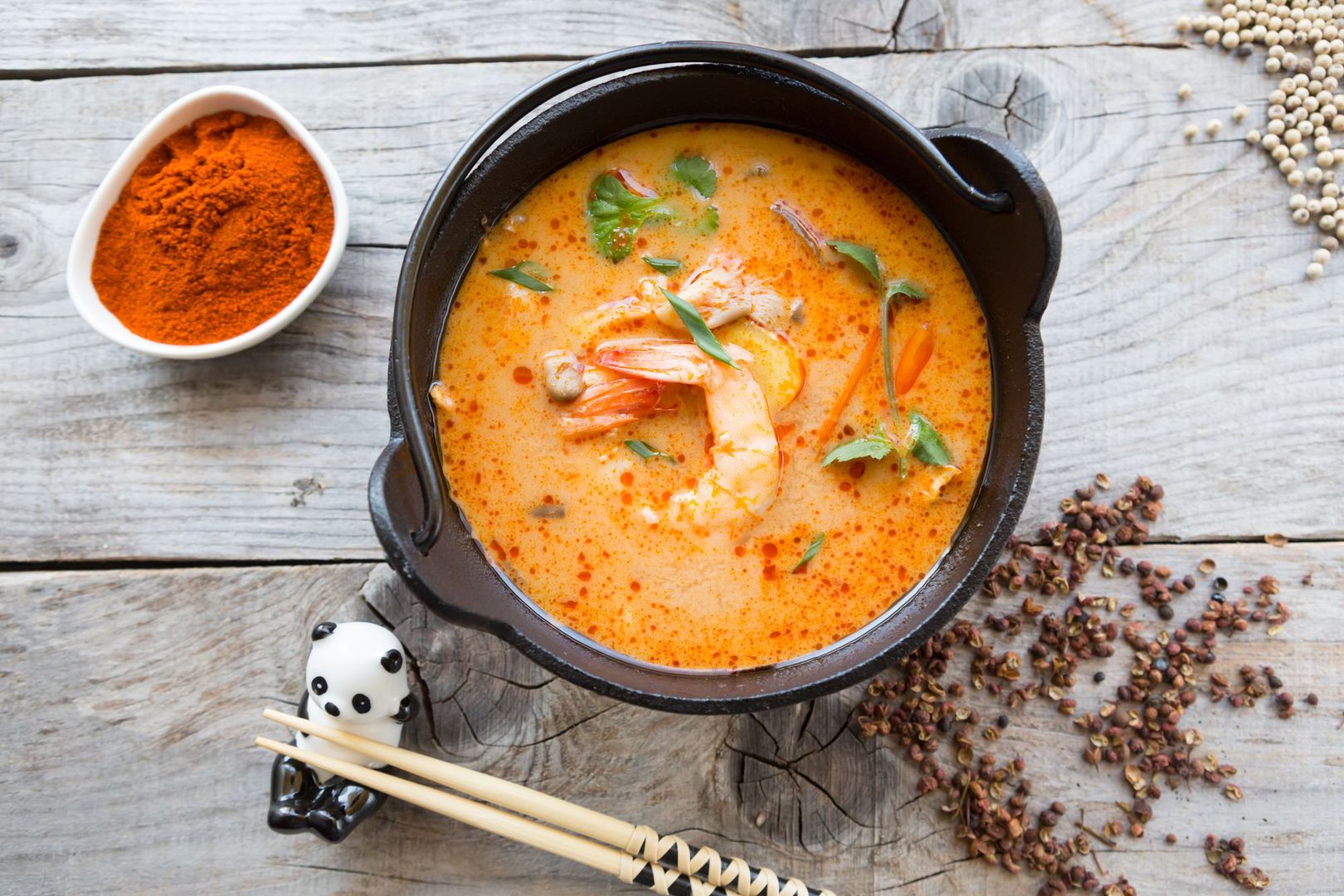 Traditional thai spicy tom yum soup in a bowl 