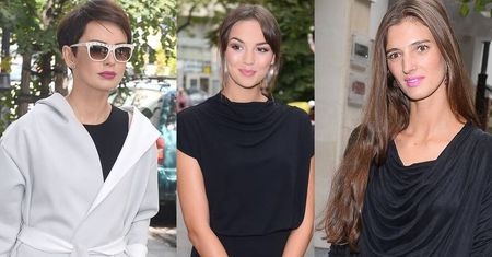Dorota Gardias w szarym płaszczyku, a Paulina Krupińska i Kamila Szczawińska w czarnych kreacjach